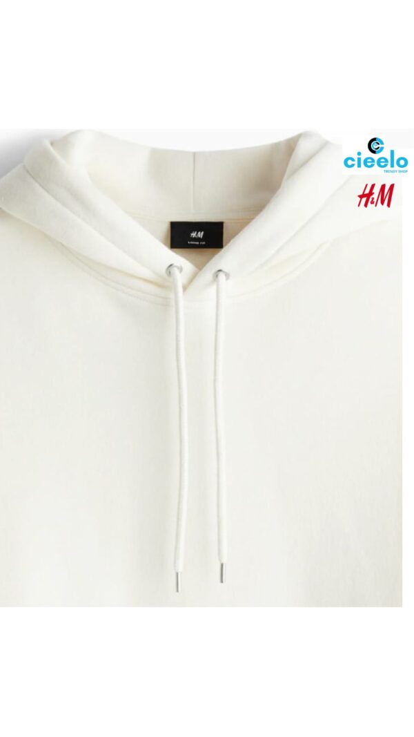 Sudadera H&M con Capucha Holgada – Estilo y Comodidad
