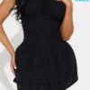 Minivestido Negro con Ojales Taya – Elegancia y Estilo
