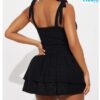 Minivestido Negro con Ojales Taya – Elegancia y Estilo