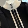 Suéter de punto con cremallera dual – Elegancia casual para días fríos