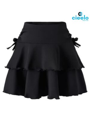 Falda negra elegante – Volumen en capas y moño chic