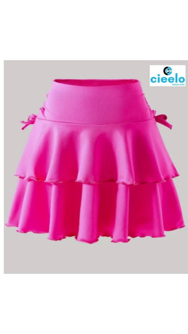 Falda negra elegante – Volumen en capas y moño chic
