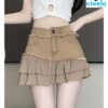 Mini Falda de Mezclilla con Volantes – Estilo Elegante y Bajo Asimétrico
